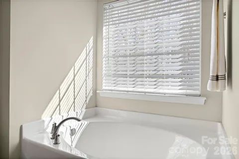 a view of a bathtub in a bathroom