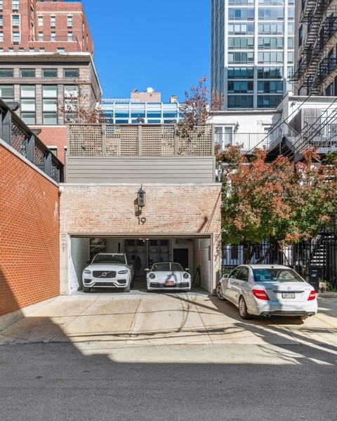 19 East Goethe Street Chicago, IL 60610 - Photo 22 of 46 a car parked in front of building