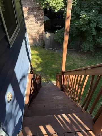a view of balcony with wooden floor
