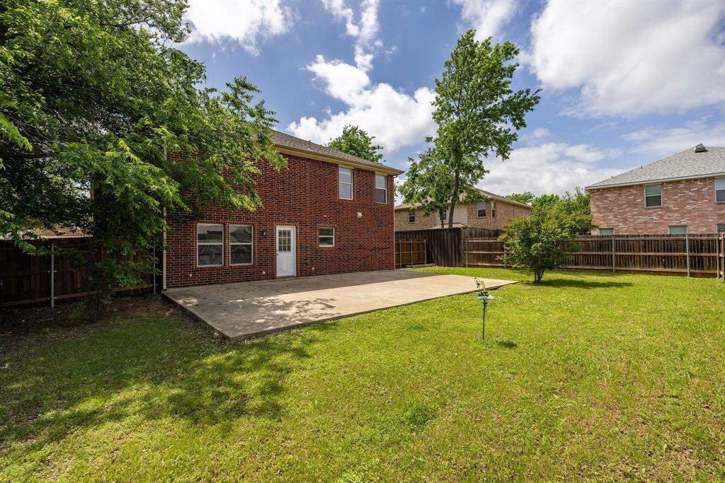 601 Amy Way Euless, TX 76039 - Photo 35 of 40 a view of a house with swimming pool and a yard