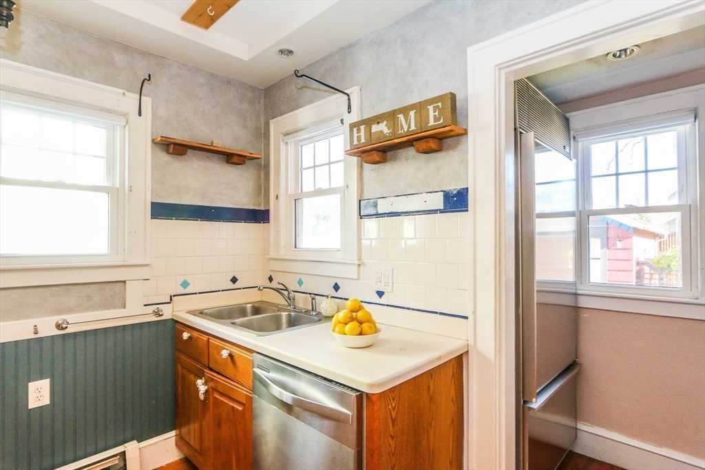 101 Manchester Terrace Springfield, MA 01108 - Photo 18 of 42 a kitchen with a sink a counter and a window