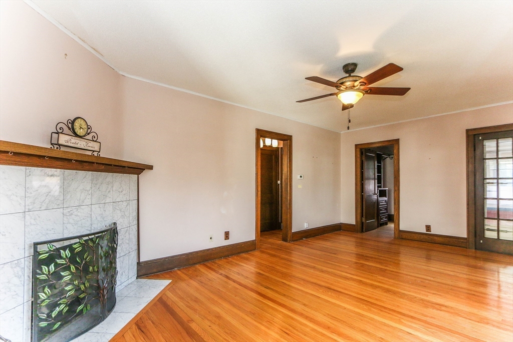 101 Manchester Terrace Springfield, MA 01108 - Photo 3 of 42 a bedroom with a bed and a fireplace