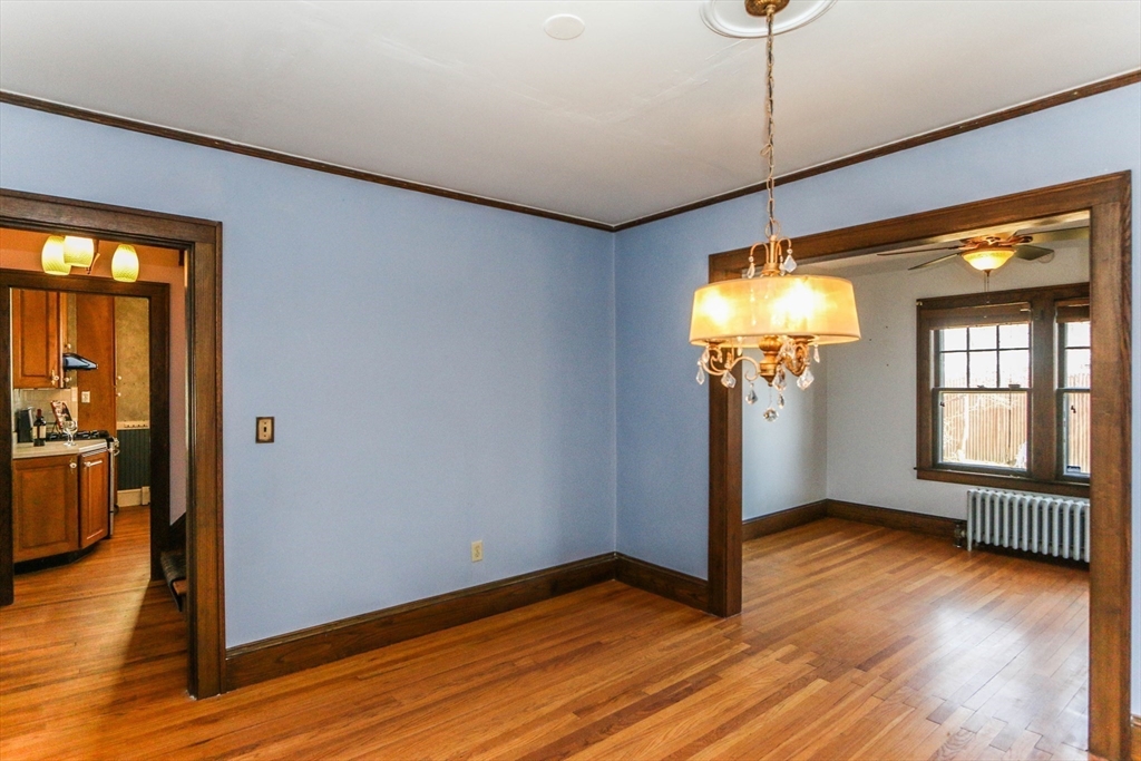 101 Manchester Terrace Springfield, MA 01108 - Photo 9 of 42 a view of empty room with wooden floor and fan