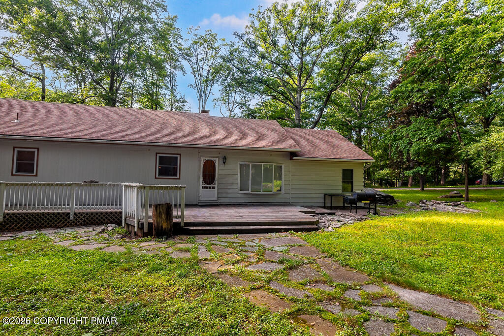 755 White Oak Road Cresco, PA 18326 - Photo 47 of 50 a view of a house with swimming pool and a yard