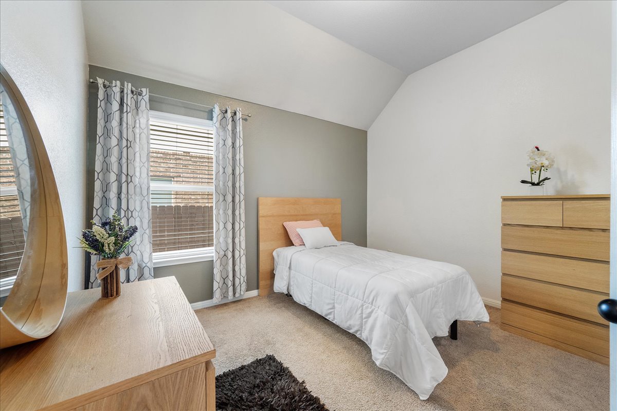 3000 Rio Verde Drive Leander, TX 78641 - Photo 13 of 23 a bedroom with a bed and a window
