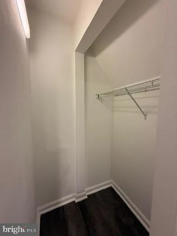 a view of a room with racks on the wall