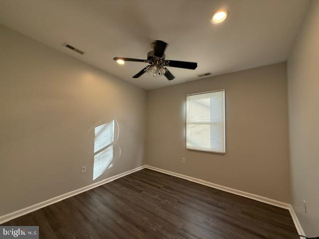 607 St Dunstans Road Baltimore, MD 21212 - Photo 18 of 25 a view of an empty room with a window