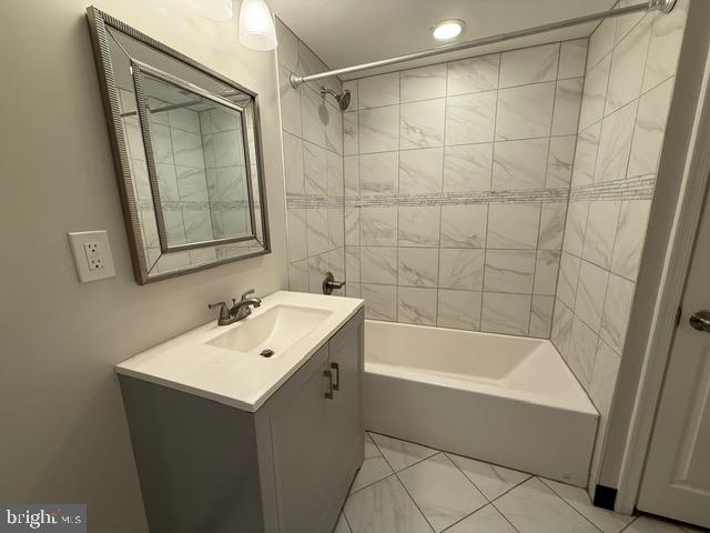 607 St Dunstans Road Baltimore, MD 21212 - Photo 22 of 25 a bathroom with a bathtub and a sink