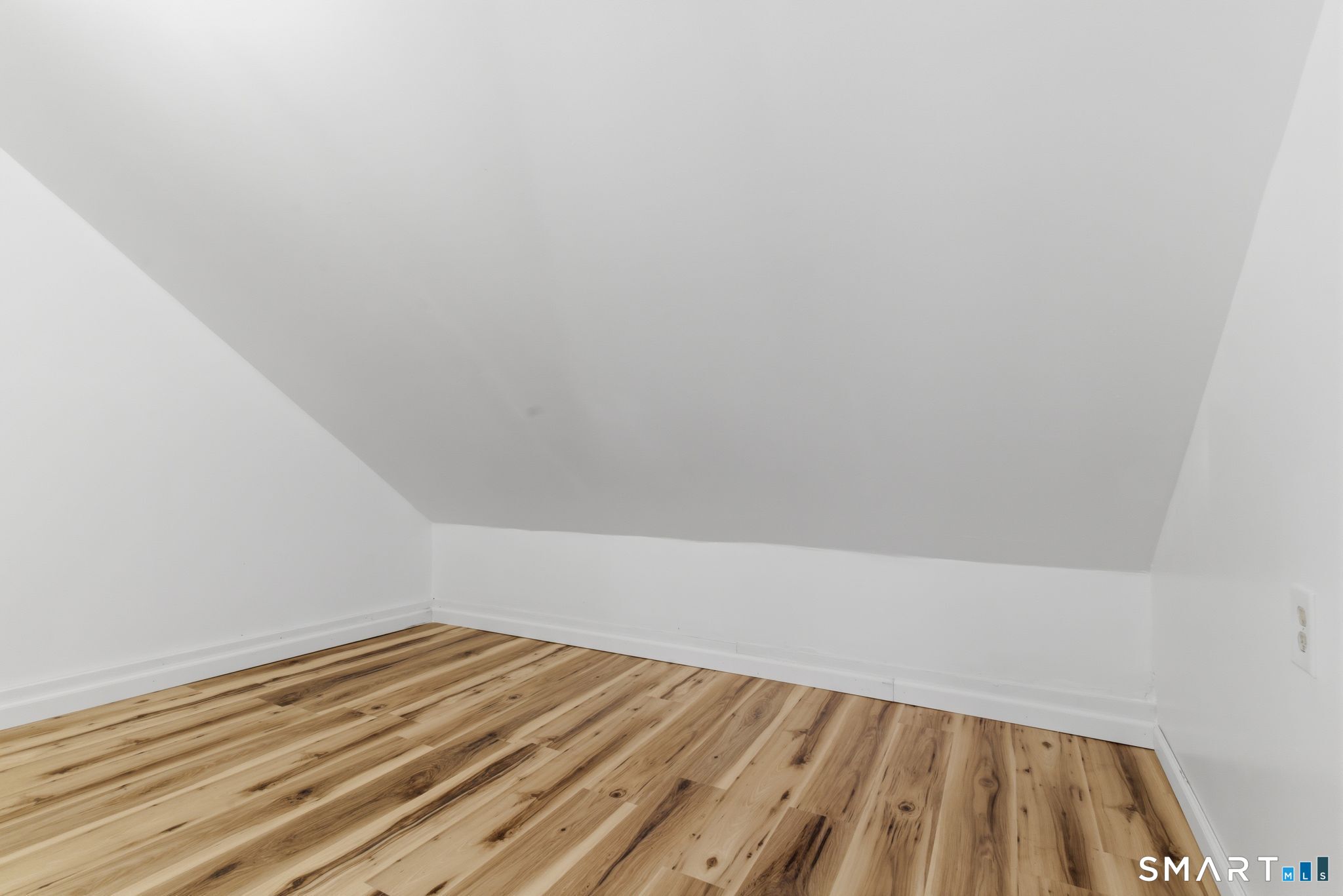 11-13 Putnam Road Plainfield, CT 06332 - Photo 22 of 33 a view of wooden floor in a room