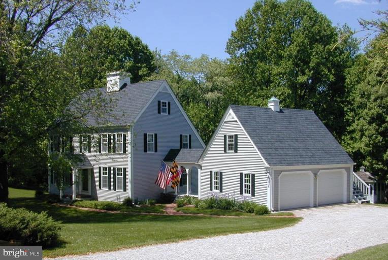 6876 Mink Hollow Road Highland, MD 20777 - Photo 1 of 1 front view of a house and a yard