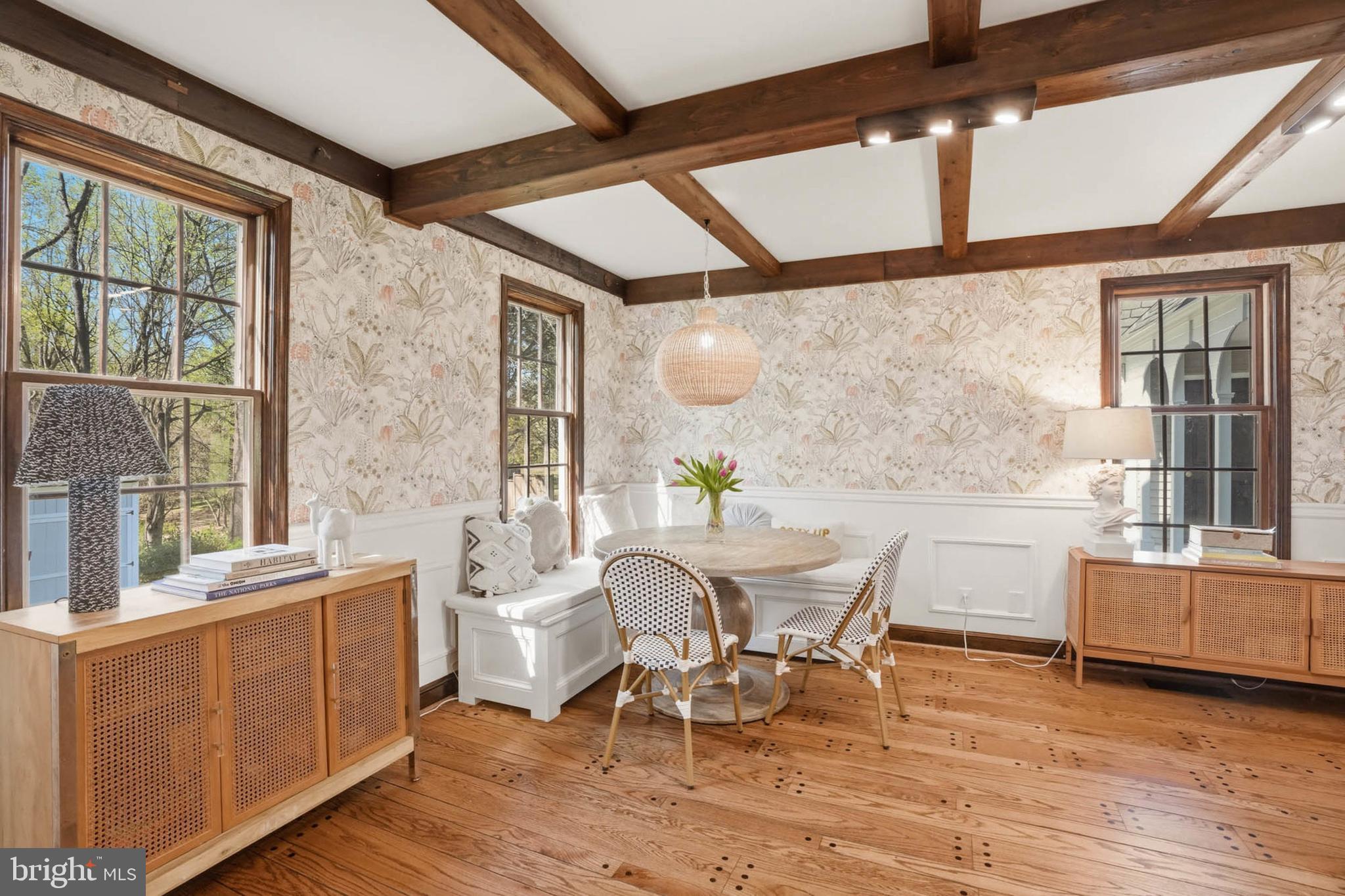 6876 Mink Hollow Road Highland, MD 20777 - Photo 14 of 61 a view of a dining room with furniture window and wooden floor