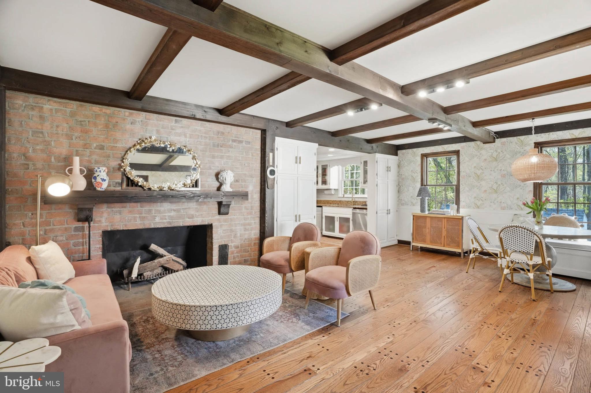 6876 Mink Hollow Road Highland, MD 20777 - Photo 17 of 61 a living room with furniture and a fireplace