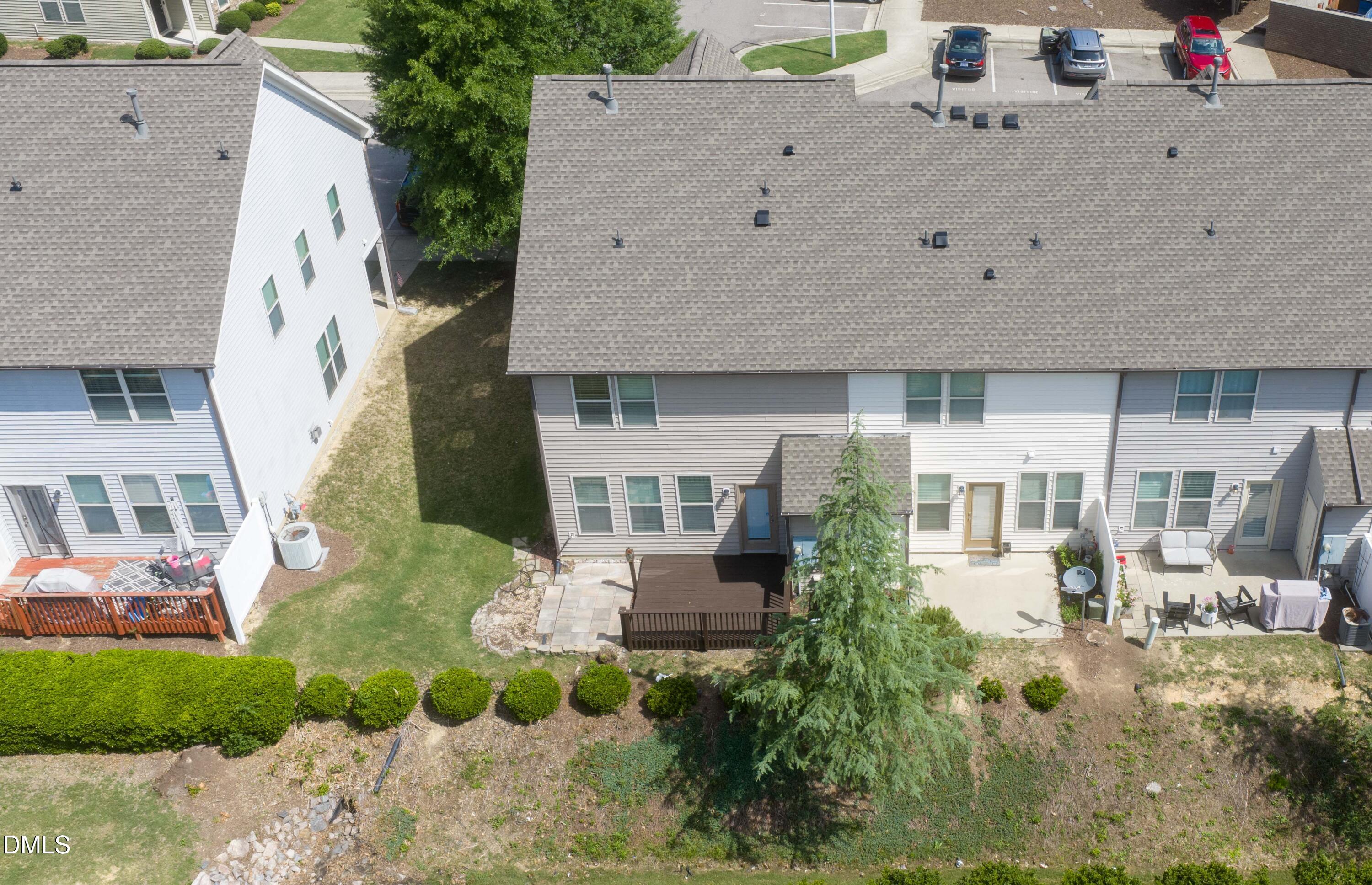 4400 Hillsgrove Road Wake Forest, NC 27587 - Photo 42 of 49 a aerial view of a house with a yard and potted plants