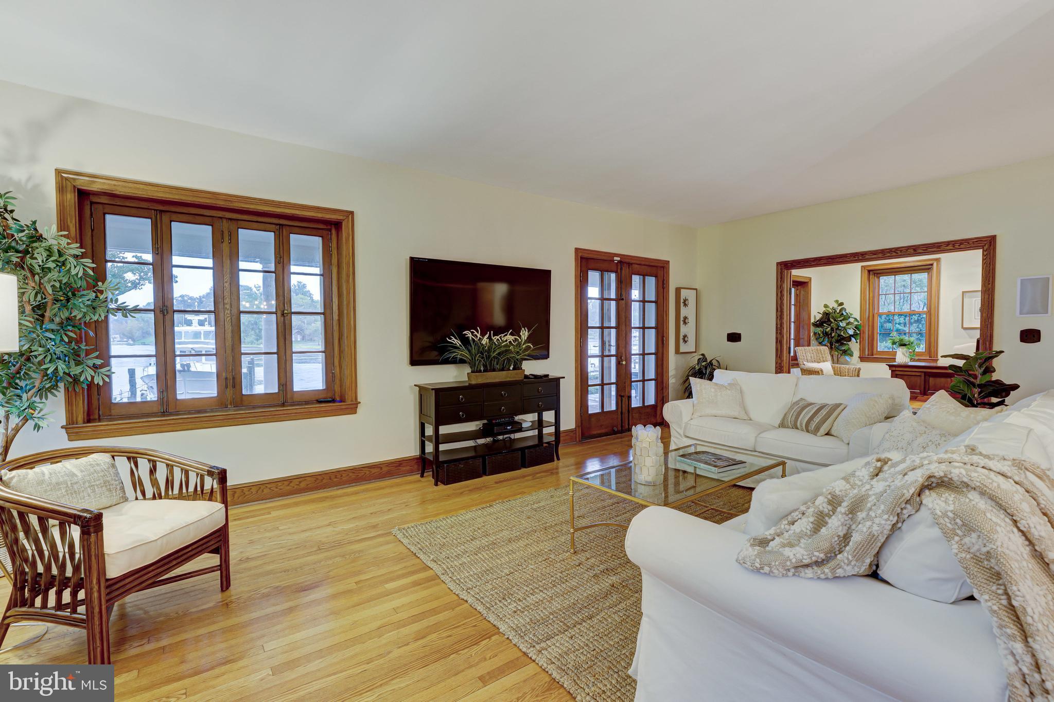 709 Dividing Road Severna Park, MD 21146 - Photo 17 of 73 Living room with original windows out to deck