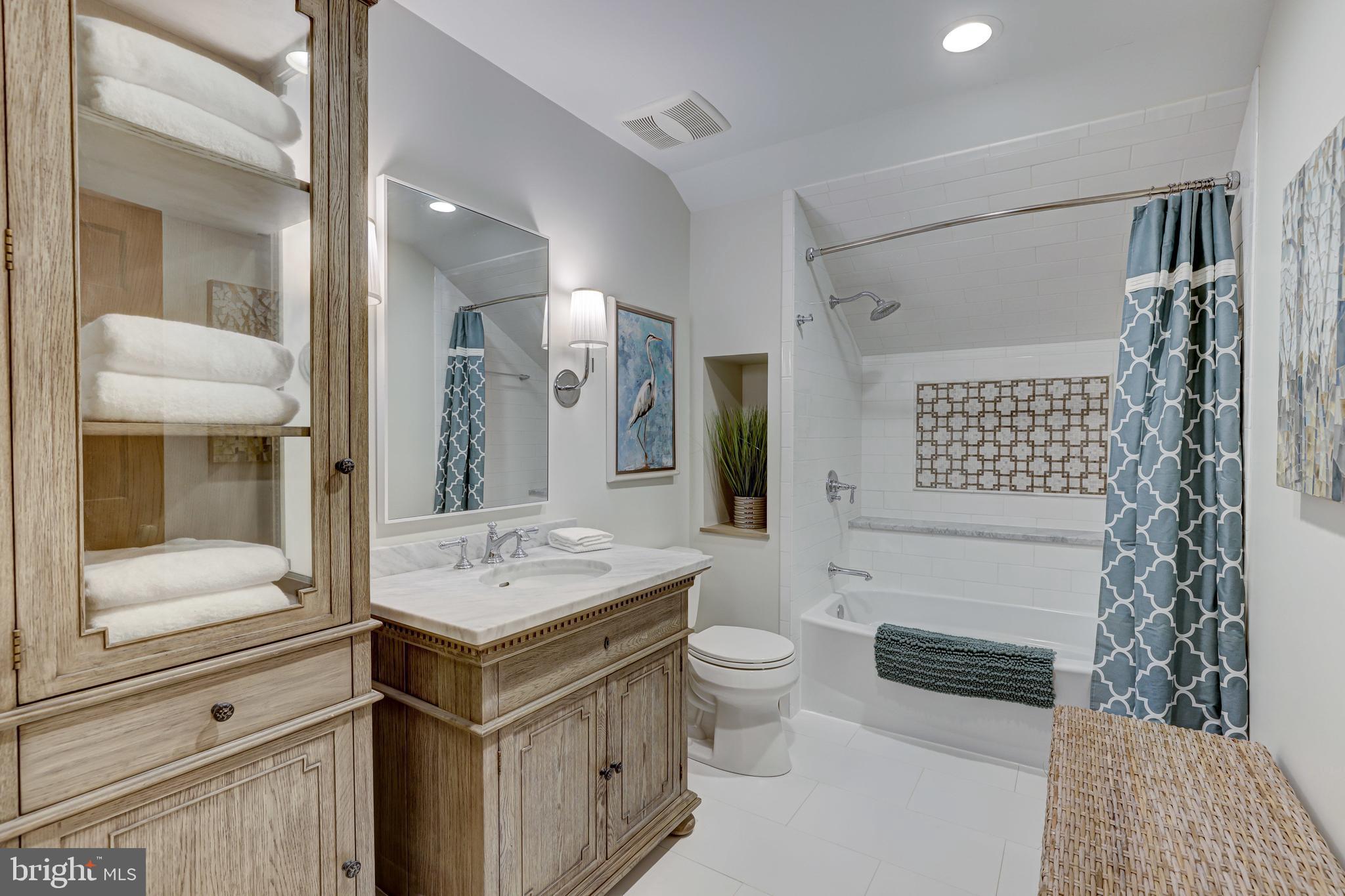 709 Dividing Road Severna Park, MD 21146 - Photo 49 of 73 3rd level full bath-Restoration Hdw vanity/cabinet