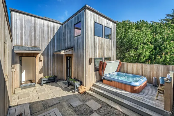 a house view with a outdoor seating space