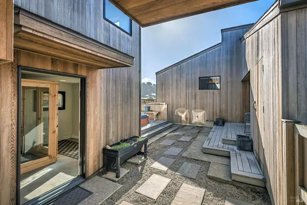 a front view of a house with a glass door