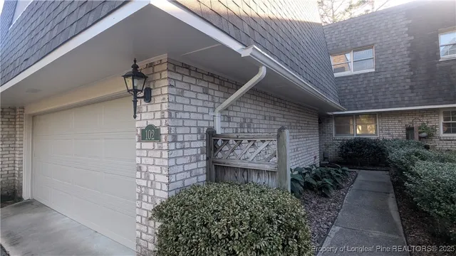 a brick building with a large windows