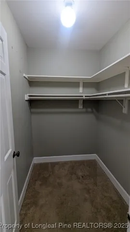 a view of a wooden door of the house