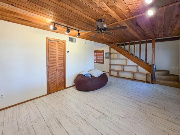 a bathroom with a toilet sink shower and mirror