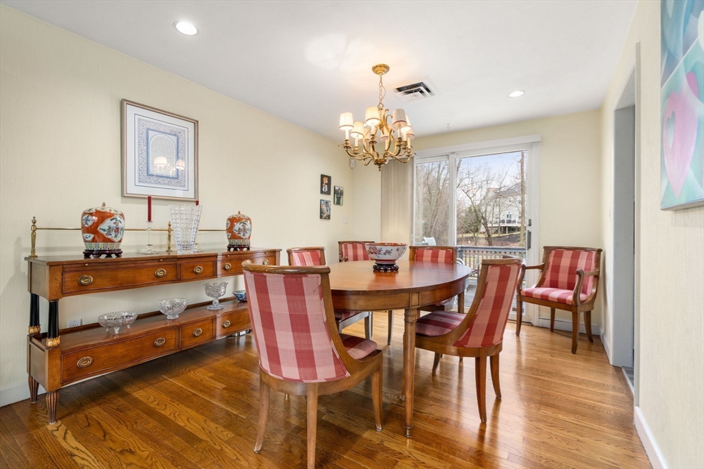 48 Gary Road Needham, MA 02494 - Photo 8 of 20 a view of a dining room with furniture and wooden floor