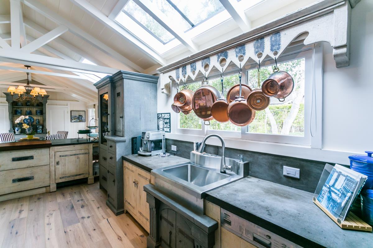0 Camino Real Carmel, CA 93921 - Photo 12 of 27 a kitchen with a sink stove and cabinets