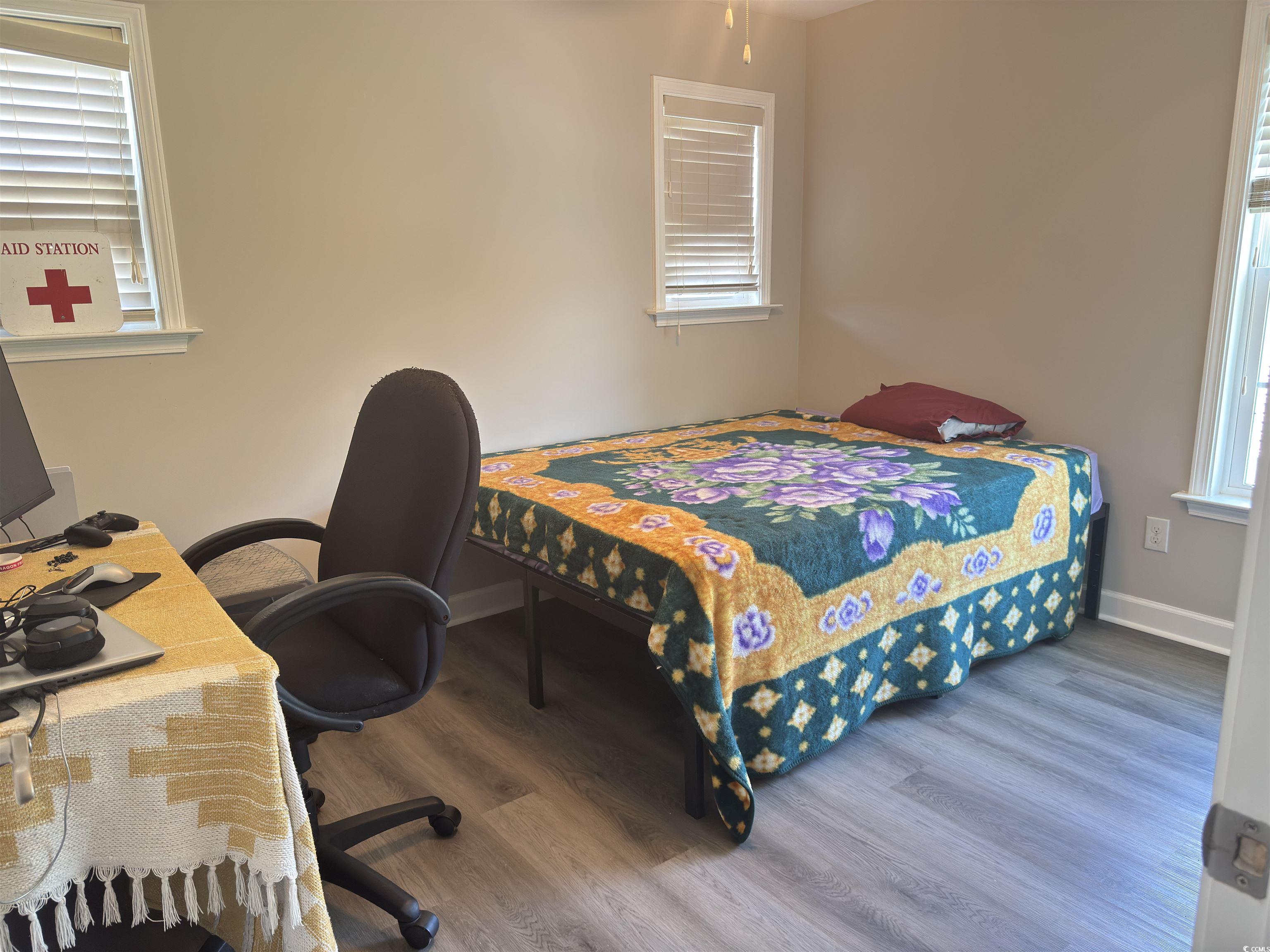 788 Rambler Court Myrtle Beach, SC 29588 - Photo 5 of 17 Bedroom featuring multiple windows and wood finish