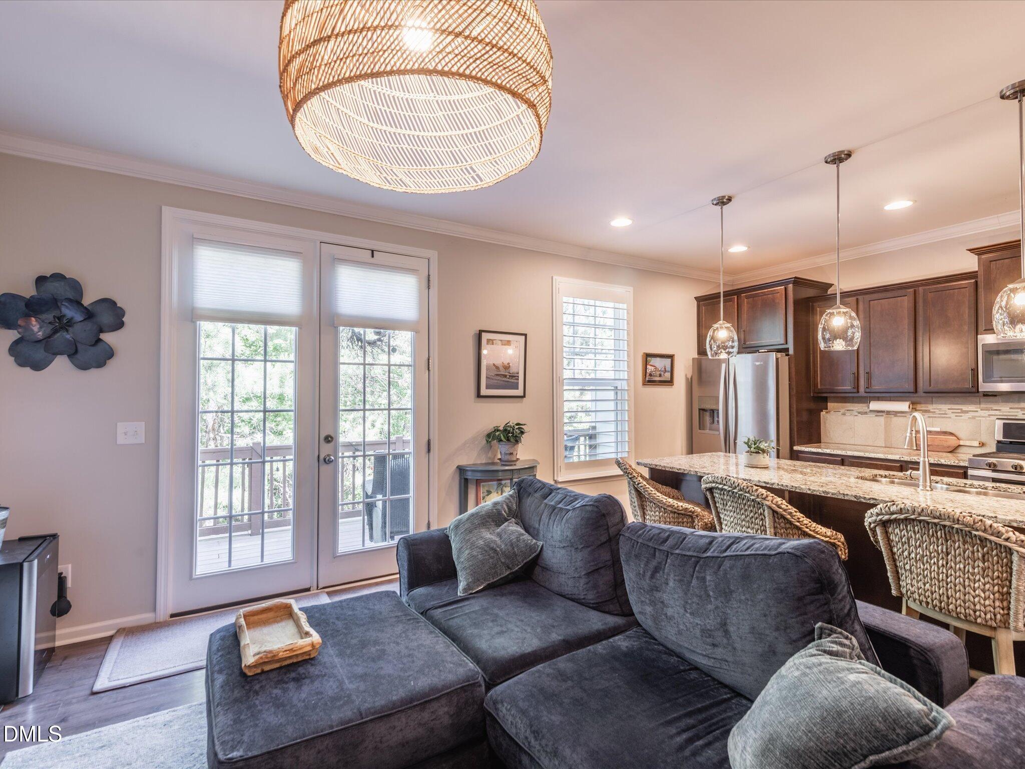 533 Metro Station Apex, NC 27502 - Photo 13 of 45 a living room with furniture and a large window