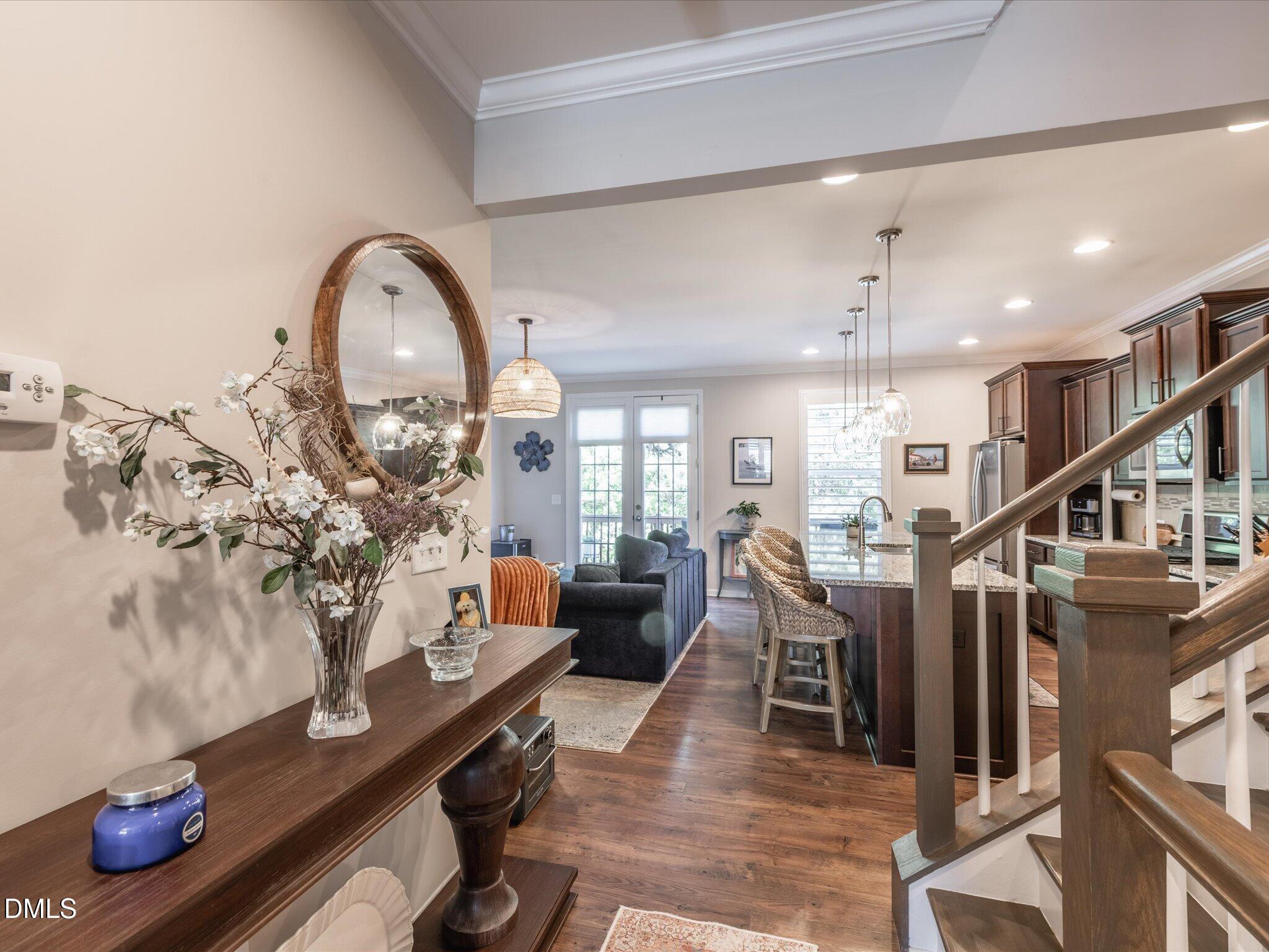 533 Metro Station Apex, NC 27502 - Photo 3 of 45 a living room with furniture and wooden floor
