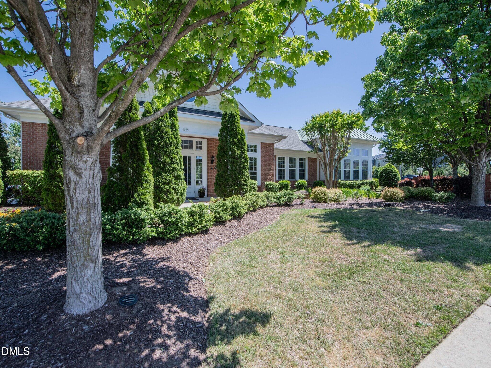 533 Metro Station Apex, NC 27502 - Photo 40 of 45 a front view of a house with garden