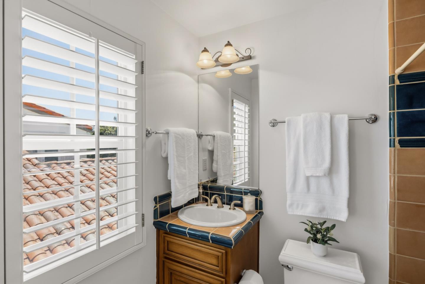 302 Pasadera Drive Monterey, CA 93940 - Photo 19 of 40 a bathroom with a sink double vanity and a mirror