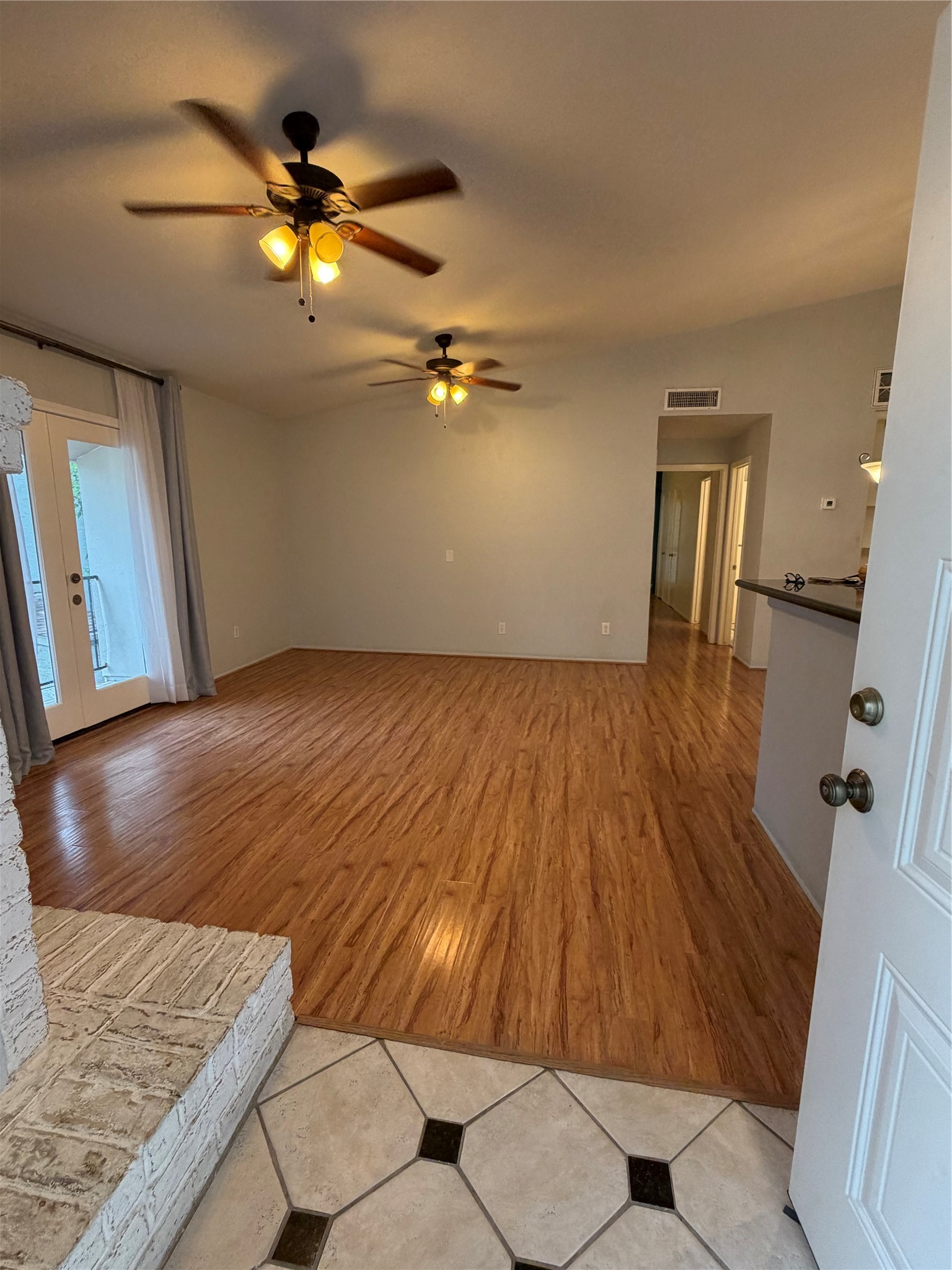 2425 Augusta Drive, Unit 36 Houston, TX 77057 - Photo 4 of 24 a view of livingroom with furniture and wooden floor