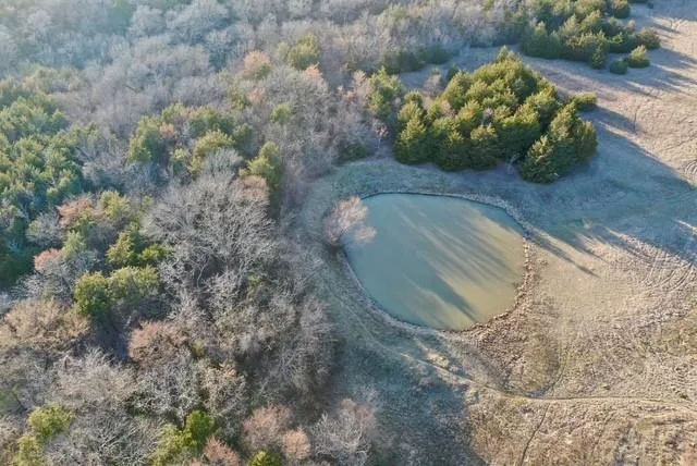 an aerial view of city and lake view