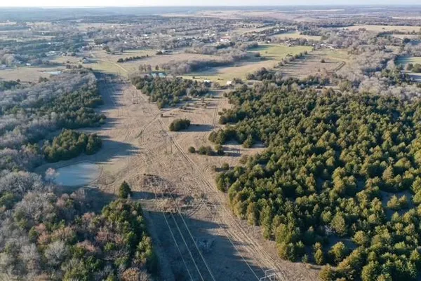 an aerial view of city and lake view