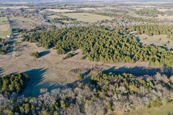 an aerial view of residential house and lake view