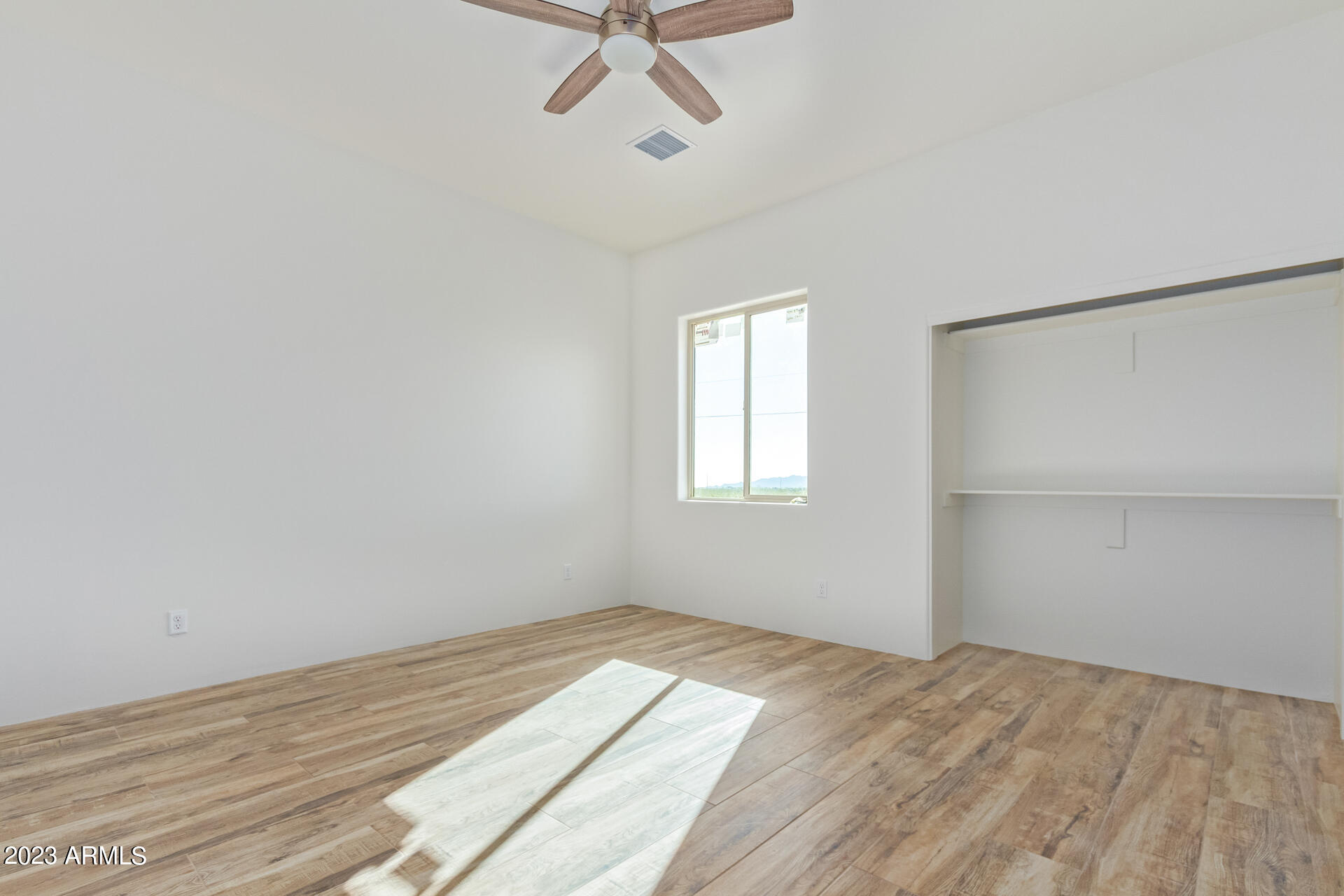 25202 West Montgomery Road Wittmann, AZ 85361 - Photo 33 of 50 Large secondary bedroom