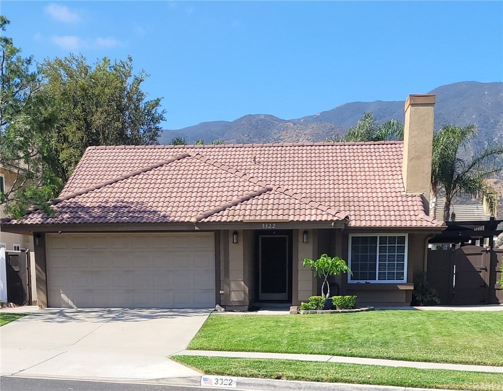 3322 Fallenleaf Drive Corona, CA 92882 - Photo 1 of 1 a front view of a house with a yard