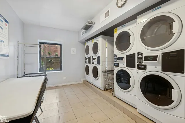 a bathroom with a toilet a sink and bathtub