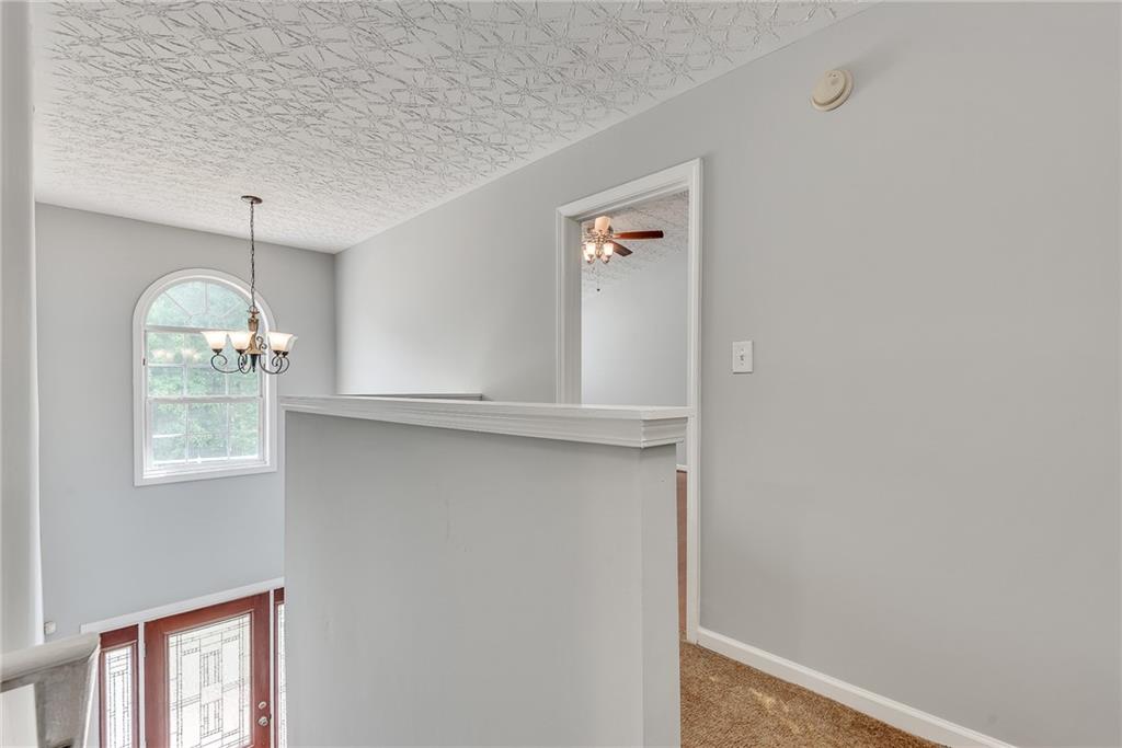 3337 Baymount Way Lawrenceville, GA 30043 - Photo 23 of 47 a view of an empty room with a window