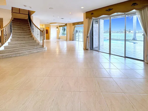 a view of room with a sink and mirror