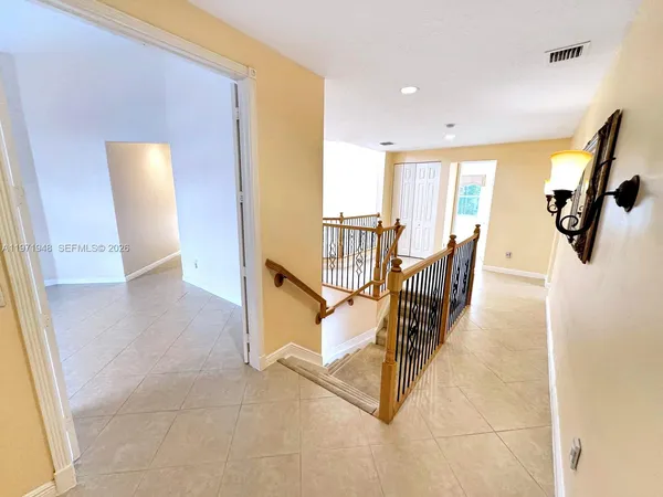 a bathroom with a bathtub and a toilet