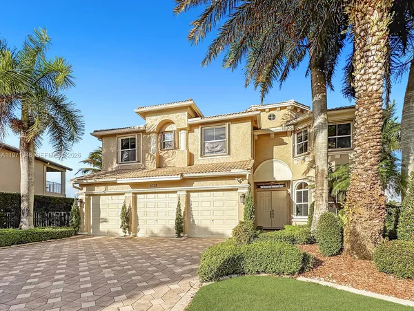 a view of a livingroom with a ceiling fan and window