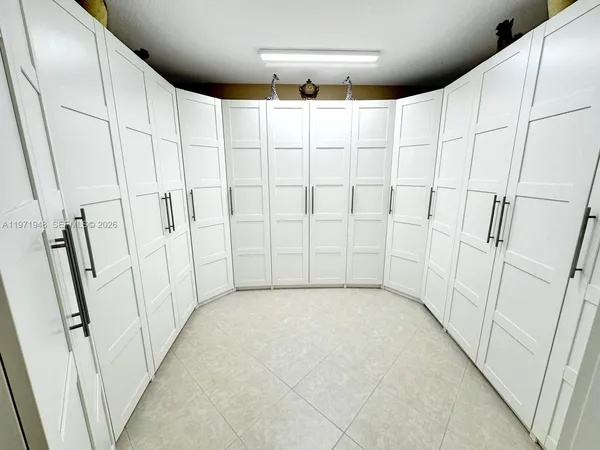 an aerial view of residential building and ocean