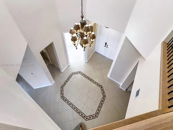 a view of a hallway with entryway