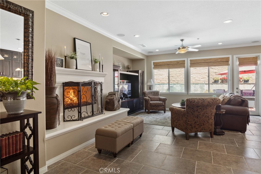 3837 Grandview Drive Brea, CA 92823 - Photo 20 of 72 a living room with furniture large window and a fireplace