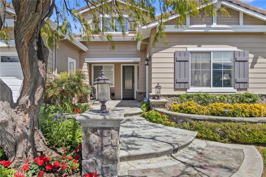 3837 Grandview Drive Brea, CA 92823 - Photo 2 of 72 a front view of a house with a garden
