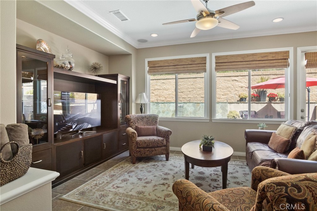 3837 Grandview Drive Brea, CA 92823 - Photo 22 of 72 a living room with furniture and a flat screen tv