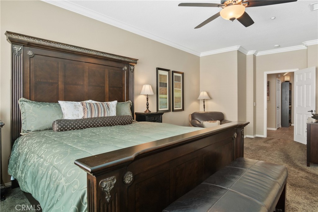 3837 Grandview Drive Brea, CA 92823 - Photo 45 of 72 a bedroom with a bed and a chandelier