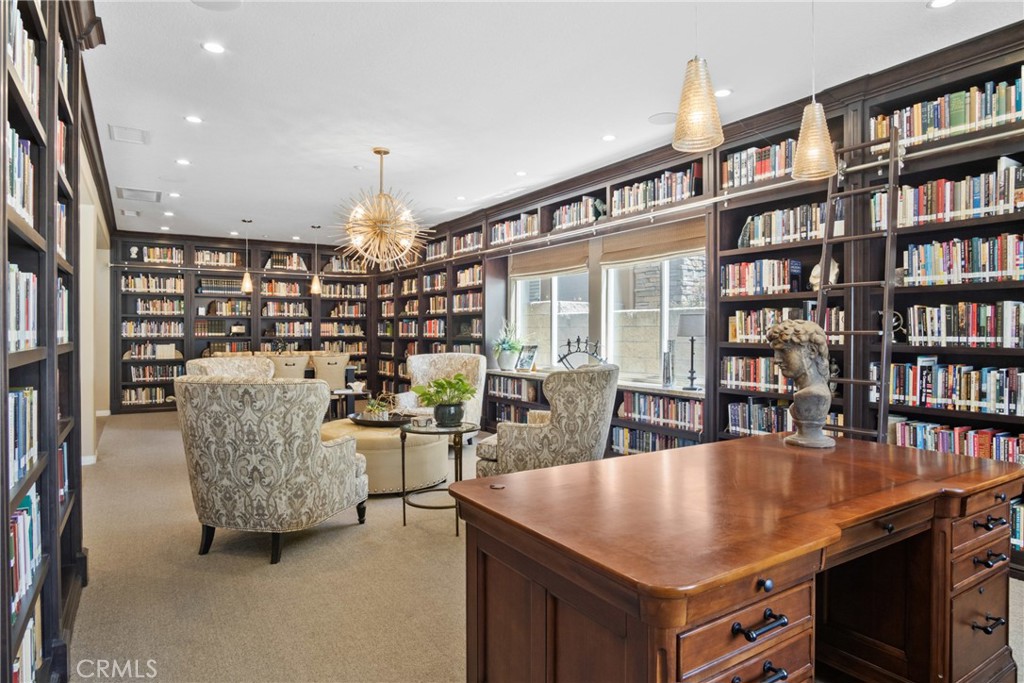 3837 Grandview Drive Brea, CA 92823 - Photo 10 of 72 a living room with lots of furniture and a book shelf