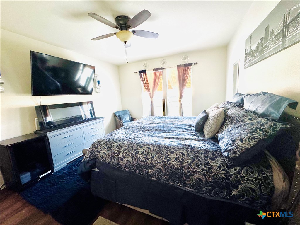 3101 Shawlands Road Killeen, TX 76542 - Photo 11 of 41 a bedroom with a bed and a flat screen tv